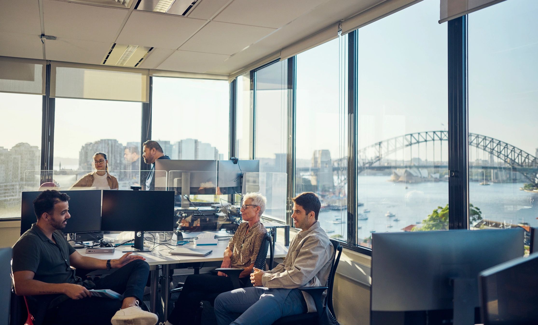Team member collaborating in a customer support office