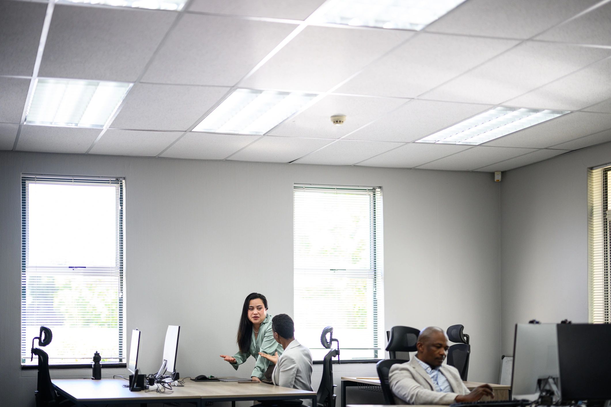 Customer support team working together in a modern office